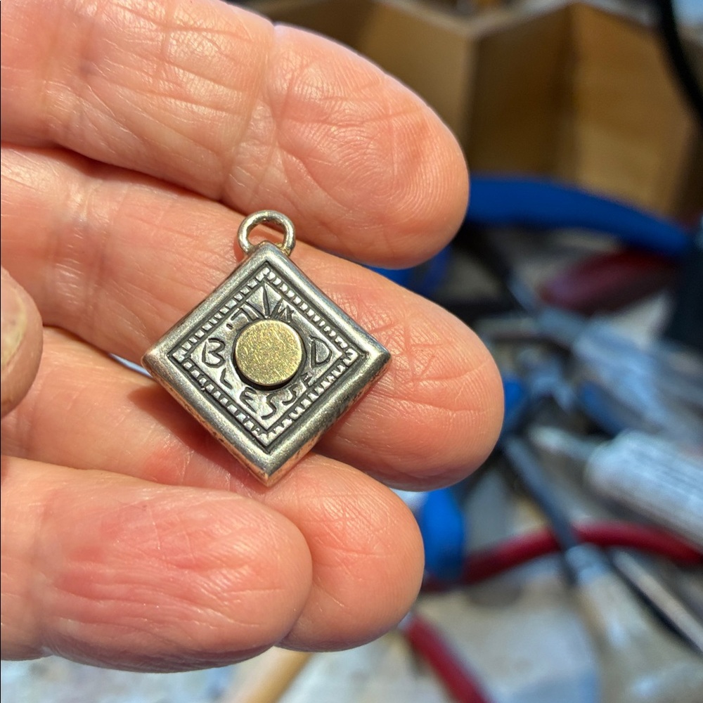 925 and 10k gold pendant “blessed’ by Lee Hee